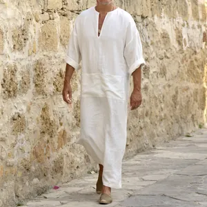 Full-length shot of a white men's cotton linen robe with a front pocket detail.