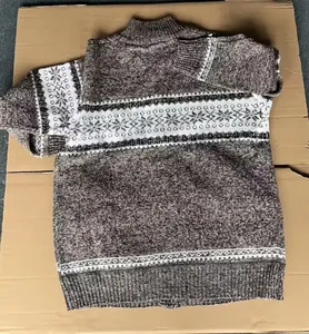 Detail showing the back and knit texture of a men's brown snowflake pattern sweater jacket