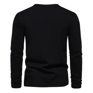 Back view of a classic black long-sleeved leisure Henley T-shirt for men in soft fabric