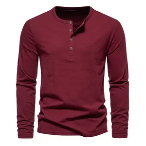 Front view of a maroon long-sleeved men's Henley shirt with a four-button placket
