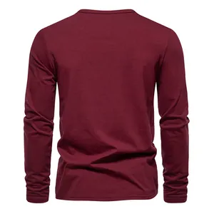 Detailed back view of a solid burgundy casual long-sleeved men's T-shirt in soft cotton