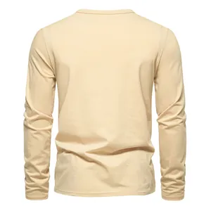 Detailed back view of a minimalist men's long-sleeved casual T-shirt in light beige knit