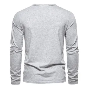 Rear view of a men's light grey heather long-sleeve Henley T-shirt in soft jersey knit fabric.