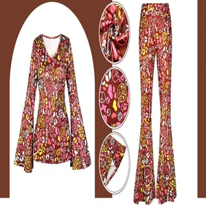 Close-up detail of 70s hippie disco outfit with bell sleeves and colorful peace sign pattern