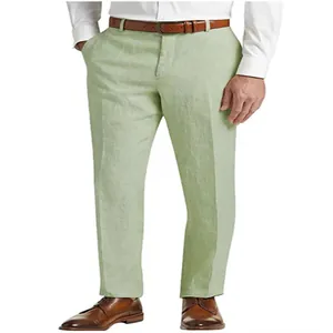 Detail shot showing the fit and light green color of breathable men's linen trousers
