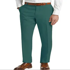 Detailed view of stylish men's green linen trousers with brown belt and leather shoes