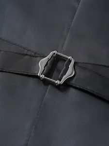 Close-up of adjustable silver buckle and strap on men's jacquard waistcoat