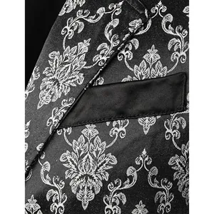 Close-up detail of men's suit vest with silver floral jacquard damask pattern texture