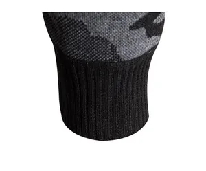 Detailed close-up of a men's camouflage knitted jacket featuring a black ribbed cuff