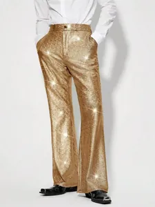 Vue détaillée du pantalon à paillettes dorées scintillantes pour la scène et les fêtes