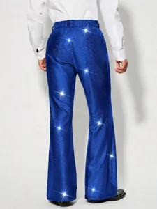 Vue arrière d'un pantalon évasé à paillettes bleues brillantes pour spectacle