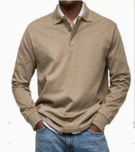 Close-up detail of a men's classic long-sleeved polo shirt in a casual tan finish