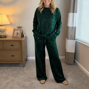 Sparkly dark green women's lounge set with long-sleeve crewneck top and wide-leg drawstring pants