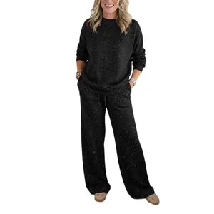 Women's sparkly black 2-piece lounge set with crew neck top and drawstring wide-leg pants.