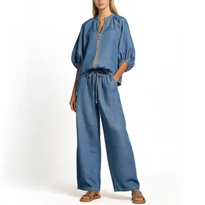 Casual χαλαρό σετ denim δύο τεμαχίων με τοπ με φερμουάρ και παντελόνι με φαρδιά μπατζάκια