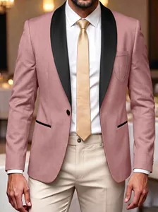 Close-up of a pink men's tuxedo jacket with contrast black lapels and a decorative pocket chain