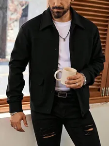 Detail shot of men's casual black woolen jacket with lapel on a model holding a mug