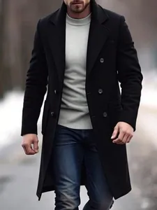 Sophisticated men's black wool trench coat styled with a grey turtleneck sweater