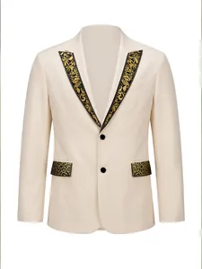 Detail of cream men's blazer with ornate gold and black floral pattern lapels