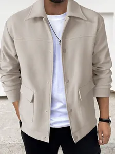 Detail of a men's beige wool-blend jacket featuring a lapel collar and snap buttons.