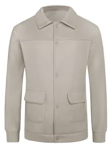 Close-up detail of a men's casual wool blend jacket with lapel collar and flap pockets
