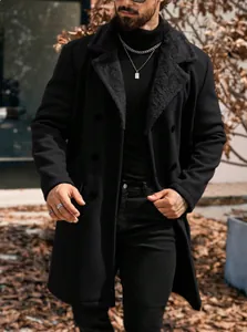 Close-up detail of men's long black wool coat featuring a warm fleece lapel collar.