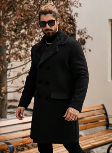 Elegant men's long black wool overcoat featuring a plush collar in an outdoor winter setting