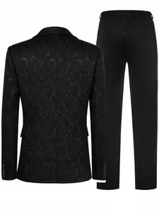 Back view of men's black jacquard suit blazer and trousers set with rose pattern texture