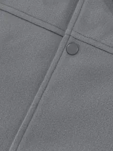 Detailed macro shot of grey woolen fabric texture and snap button on men's jacket