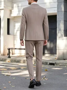 Detailed back view of a men's slim-fit pinstripe business suit in a light brown fabric