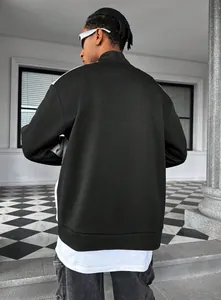 Detail view of men's racing style streetwear jacket in black and white color block
