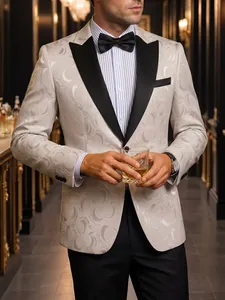 Close-up of elegant men's jacquard tuxedo with black peak lapel for formal banquets