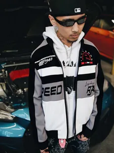 Close-up detail of a racing-style streetwear jacket with bold Speed and 1943 typography