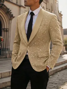 Detail van de glanzende witte spettertextuur op een goudkleurige herenfeestblazer jas.