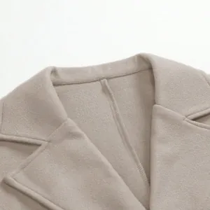 Close-up detail of the lapel and high-quality fabric texture on a men's wool overcoat