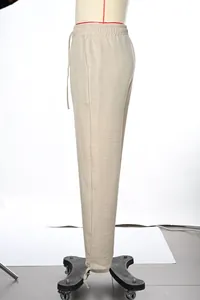 Side view of men's loose casual straight drawstring trousers in beige linen-look