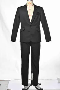 Detail showing the clean tailoring and premium fabric of this black men's suit set.