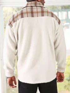 Close-up back view of men's fleece jacket featuring stylish brown plaid patchwork.
