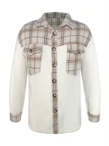Close-up showing the plaid and white fleece patchwork detail on this men's street jacket