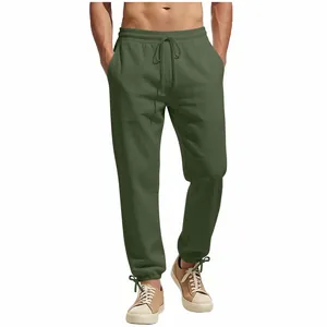 Men's olive green casual drawstring pants featuring adjustable hem and elastic waist
