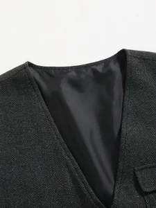 Close-up detail of a men's business vest featuring V-neck and grey herringbone fabric