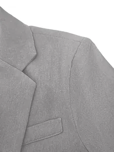 Detailed close-up of a grey business suit jacket showing fabric texture and notch lapel
