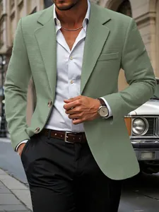 Detailweergave van lichtgroene herenblazer met textuur voor zakelijke casual