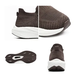 Detail view of brown knitted sock shoes showing sole texture and sturdy heel support.