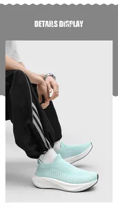 Side view of breathable light blue knit sock shoes slip-on sneakers for men and women