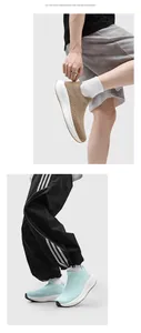 Detail view showing breathable flyknit mesh sock sneakers with thick cushioned rubber soles