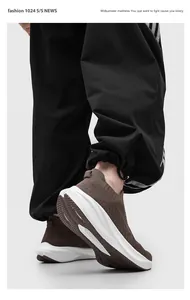 Detailed macro view of brown flyknit socks shoes with thick white sole and non-slip texture