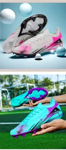 Professional soccer cleats with colorful gradient design and FG/AG studs