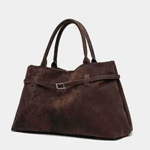 Vintage brown suede tote bag with decorative buckle and large capacity for commuting