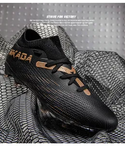 Macro view of seamless flyknit texture and AKADA branding on black soccer cleats